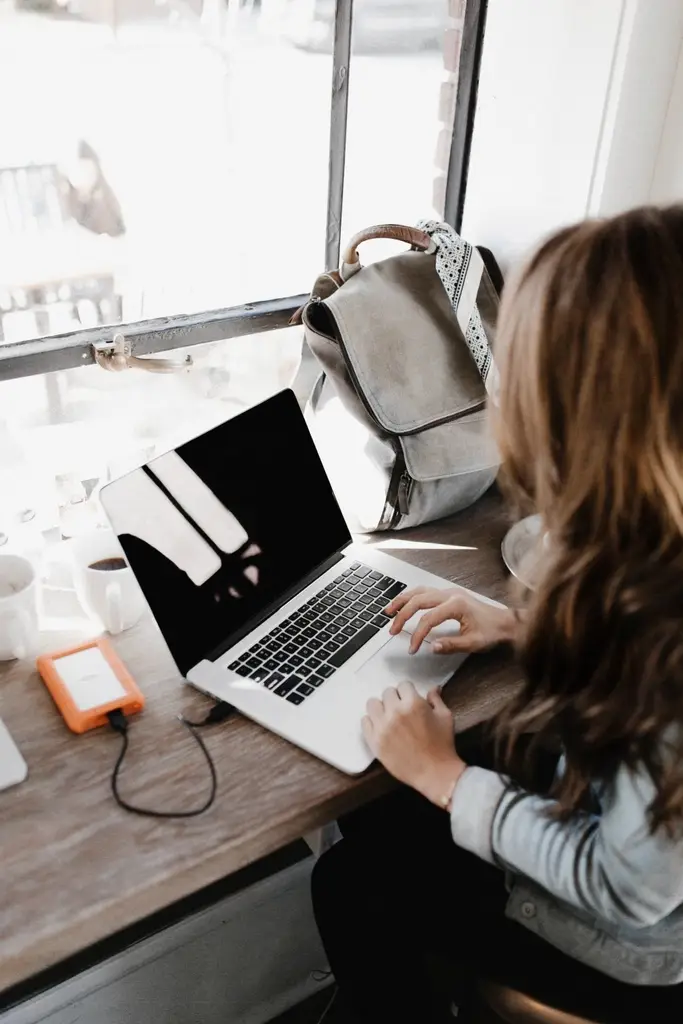 A student working on a laptop